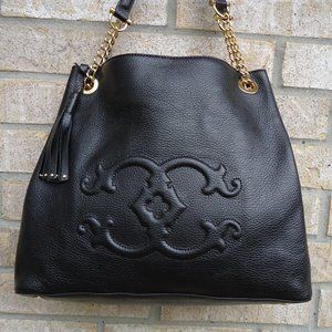 C. Wonder black pebbled leather purse.